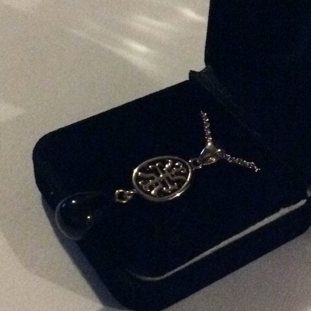 Black and gold necklace new in box